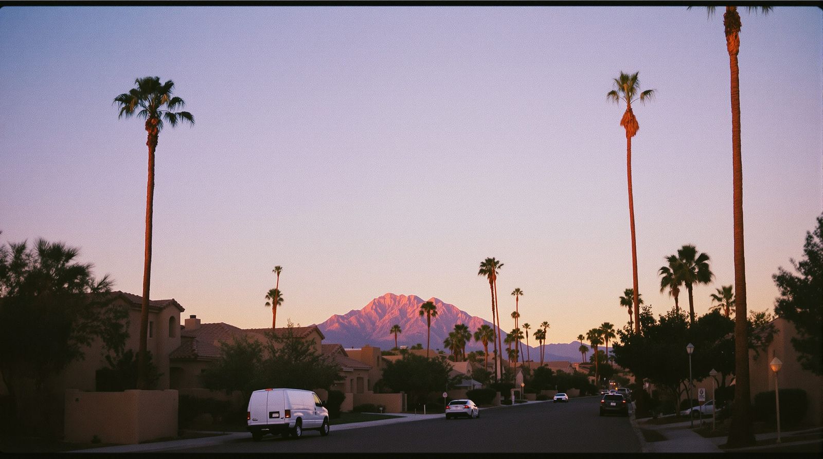 Independent ASE-certified mobile mechanic servicing a car's cooling system at a driveway in Chandler, Arizona